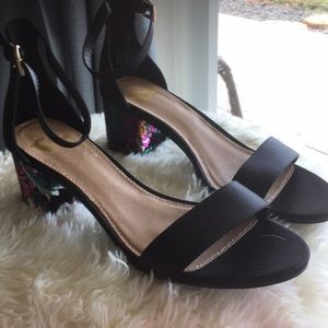 Black kitten heels with embroidered detailing